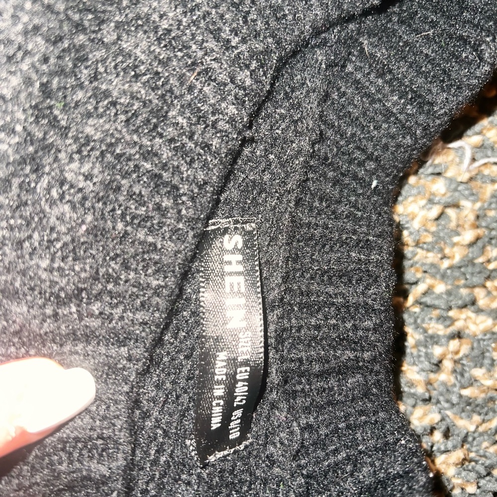 Woman’s Cold Shoulder Sweater